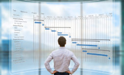 Project manager looking at AR screen, Gantt chart schedule, planning