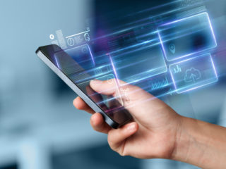 Hand using phone information database concept Hand using phone information database concept