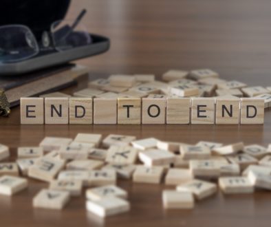 End To End the word or concept represented by wooden letter tiles